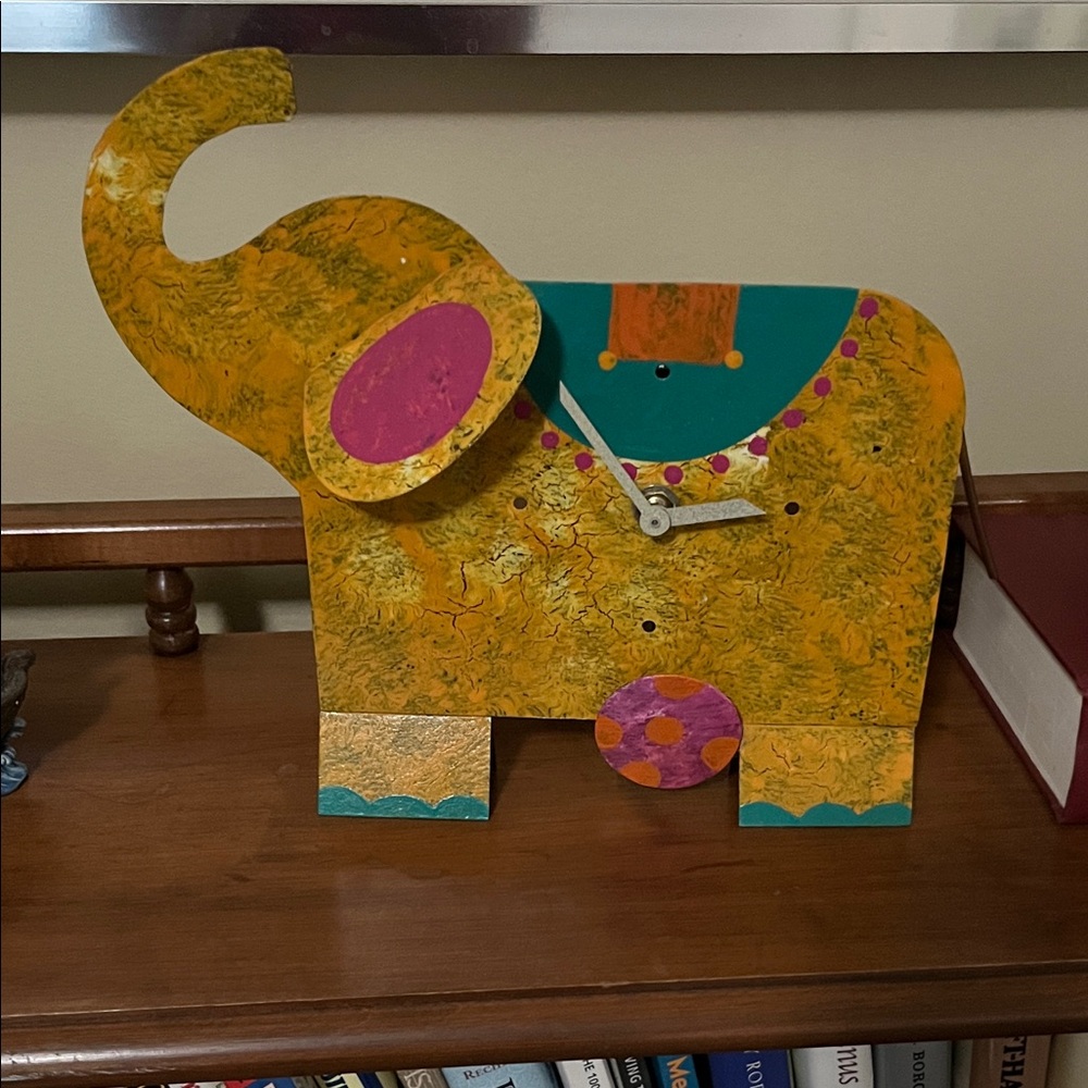 Artistic Elephant Clock with Gold and Black Accents